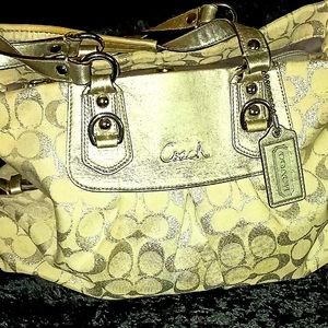 Authentic Coach gold canvas and leather purse
